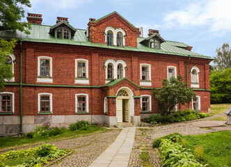 Former cell housing with a refectory, early 20th century, at the Resurrection Skete of the Valaam Monastery on Valaam Island in the Republic of Karelia. View from the southwest
