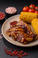 Grilled boneless chicken legs baked on the barbecue for lunch. Grilled chicken as a background