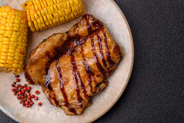 Grilled boneless chicken legs baked on the barbecue for lunch. Grilled chicken as a background