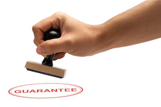 Hand stamping 'GUARANTEE' in bold red seal of approval