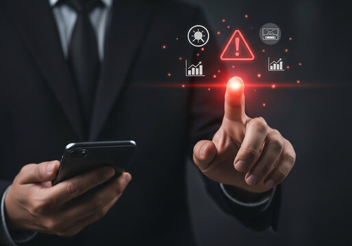 Businessman's hand touching a virtual screen with a red warning alert, symbolizing immediate action against a digital threat or system error - Powered by Adobe
