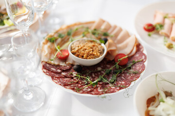 delicious fresh meat snacks on the table in a restaurant