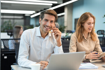 Friendly and helpful customer service support specialists in work