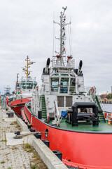 Close-up of Tugboats Docked at Industrial Pier