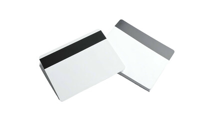 Two rectangular, white cards with magnetic stripes, on a black background, one upright