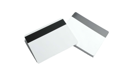 Two rectangular, white cards with magnetic stripes, on a black background, one upright