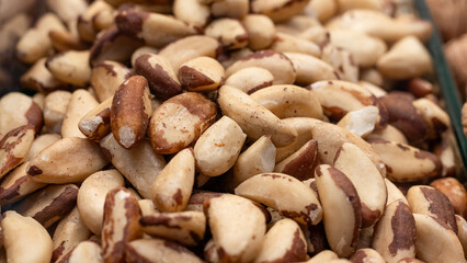 A macro shot of Brazil nuts with their characteristic brown and cream tones. Suitable for illustrating organic snacks, exotic nuts, or healthy fats for nutrition and wellness topics.
