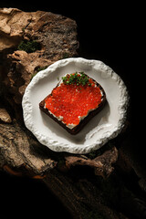 delicious sushi presentation, elegant plate of gunkan sushi topped with