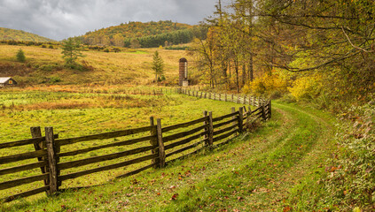 autumn landscape with fence