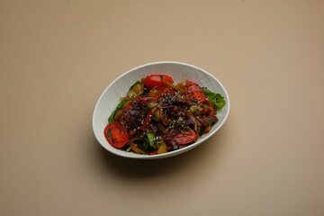 This dish features a vibrant blend of mixed vegetables, beautifully