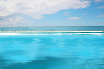Swimming pool with clear water and infinity view on ocean