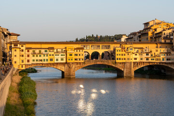 Ponte Vecchio stradling the Arno River, Florence, Tuscany, Italy