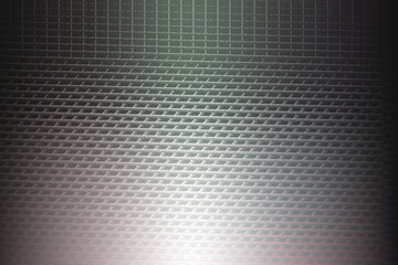 A mesmerizing closeup of a textured surface, revealing a complex pattern of geometric shapes and subtle color gradients, creating a visually stimulating effect