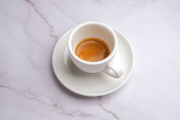 Savoring a Delicious Espresso in a White Cup, Perfectly Positioned
