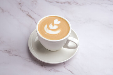 Enjoy an Artisan Latte Featuring a Beautiful Heart Design Served