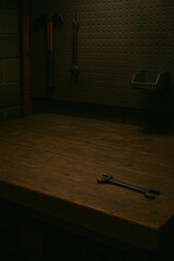 quiet workshop scene, lone wrench in dim garage, nighttime mechanic workspace with tools and oil