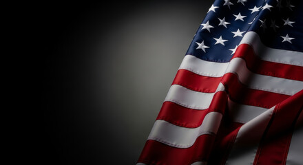 A close up shot of an american flag with red and white stripes and white stars on a blue field
