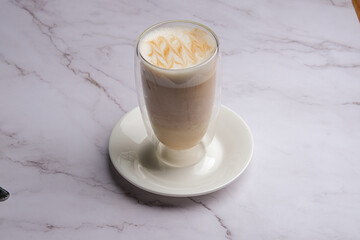Savor the Delicious Caramel Latte beautifully presented in a Clear