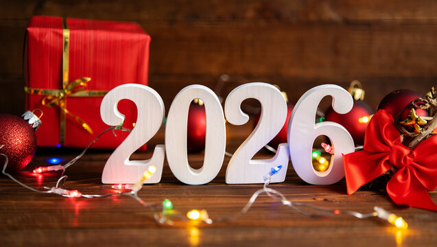 White wooden numbers twenty six with festive decorations christmas year