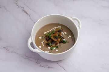 Enjoy a Delicious Mushroom Soup prepared with Cream and topped