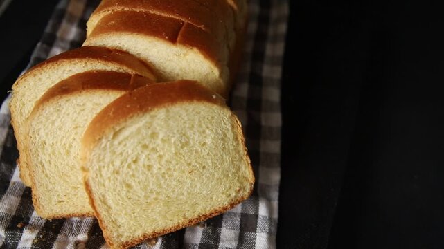 Brioche bread slices bakery pastry natural product tasty snack fresh delicious gourmet food background on the table rustic top view copy space