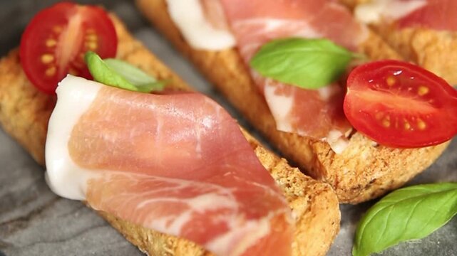 jamon bruschetta prosciutto appetizer portioned tapas dish natural tasty snack fresh delicious gourmet food background on the table rustic top view copy space