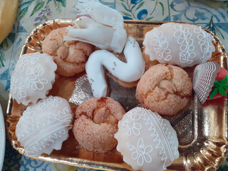 Cagliari, Sardinia, Italy, March 16, 2024. A tray of Sardinian sweets. Soft amaretti biscuits, a...