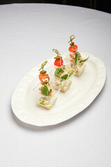 refined seafood snacks, chic seafood appetizers with toppings, stylish seafood