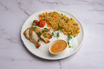 Indulge in the Delicious Grilled Chicken served with Flavorful Rice