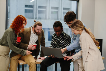 Diverse startup team collaborating on business project