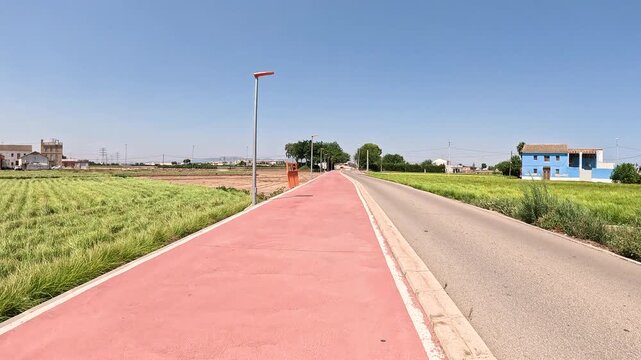 Via Xurra bicycle path through agricultural fields next to Alboraia (Alboraya), comarca of Huerta Norte, Valencia, Spain