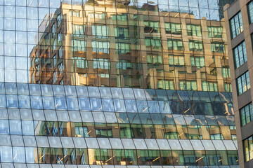Obraz premium New York - aerial view and details of the city's skyscrapers (blue hour), abstract view of skyscraper's facade 