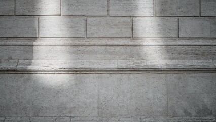 Weathered limestone brick wall texture with subtle light streaks, sharp detail exterior building;...