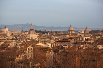 Sunset Skyline of Rome with Historic Domes
