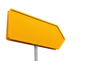 A blank yellow arrow shaped traffic sign on a pole viewed from a low angle against a solid black background