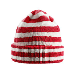A cozy red and white striped knit beanie perfect for winter isolated on a black background
