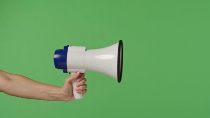 A woman hand holding a megaphone on a green chroma key background. Shot for designs related to office, business, education, training, or social matters. - Powered by Adobe