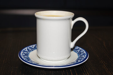 Traditional Mexican Vanilla Atole on Rustic Wooden Table