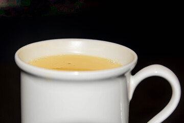 Traditional Mexican Vanilla Atole on Rustic Wooden Table