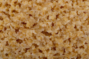 Cooked wheat porridge close-up texture