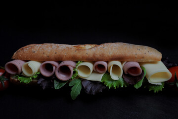 Sandwich with fresh bread cheese ham and lettuce