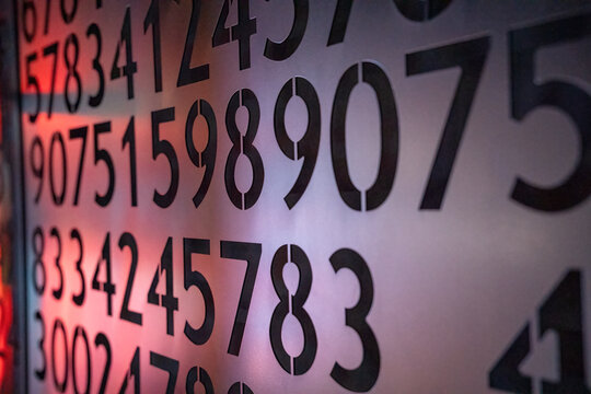Detailed shot of numeric sequence imprinted on wall showcasing modern design and structure