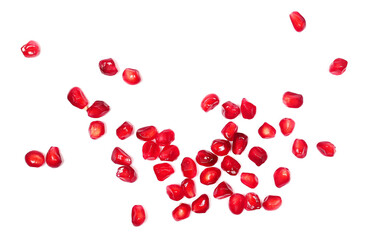 Seeds of pomegranate isolated on white background, top view