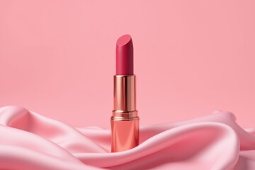 Silky Elegance: Pink Lipstick on Soft Satin Fabric