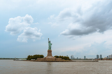 Statue of Liberty viewed from afar under clear sky