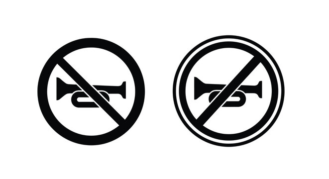 No honking signs depicted in black and white prohibiting vehicle sound signals