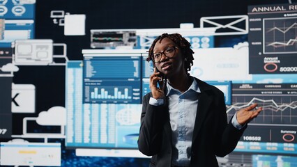 Manager doing telephone call with shareholders, talking about business market graphs, doing brainstorming. Businesswoman chatting with partners in call about financial reports, camera A