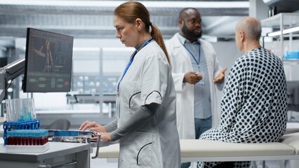 Woman expert examining chemical reaction to patient vitals in clinical procedure, testing new drug...