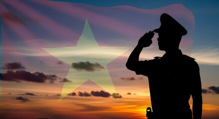 Silhouette of a uniformed officer saluting with the flag of Vietnam superimposed over a dramatic sunset sky.