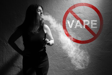 Woman exhaling vapor with electronic cigarette near no vaping sign, concept of health risks and...